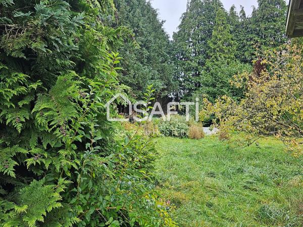 Beau terrain à bâtir de 21 ares