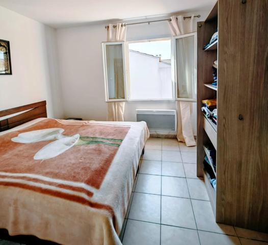 Maison de ville 60m² balcon/cave 28m²/pkg securisée