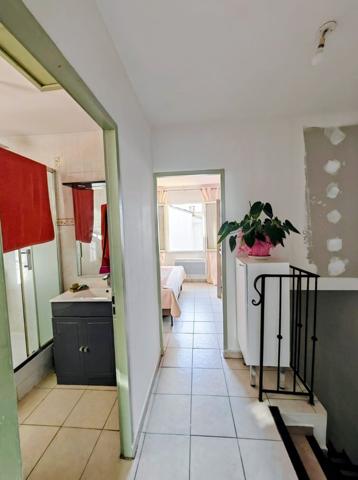 Maison de ville 60m² balcon/cave 28m²/pkg securisée