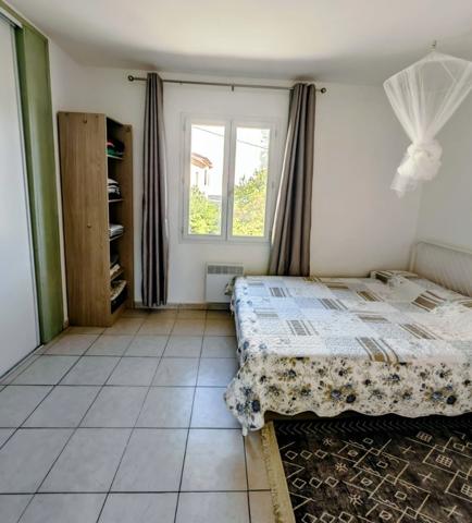 Maison de ville 60m² balcon/cave 28m²/pkg securisée