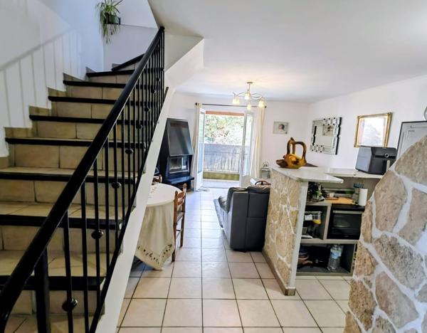 Maison de ville 60m² balcon/cave 28m²/pkg securisée