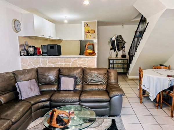 Maison de ville 60m² balcon/cave 28m²/pkg securisée