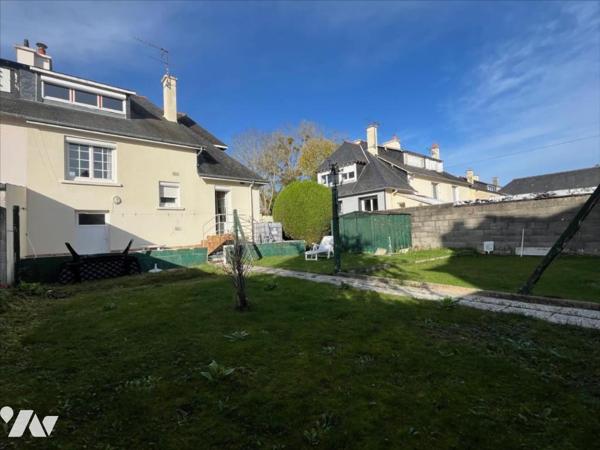 MAISON A USAGE D'HABITATION MITOYENNE D'UN COTE