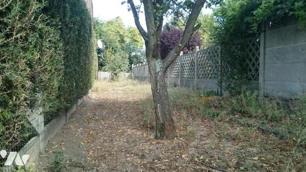 Plain pied en centre ville d'avion avec jardin et garage