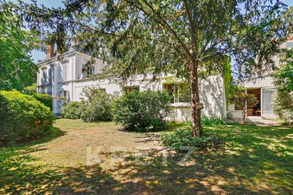 Propriété d'exception: ensemble immobilier de 2 maisons sur terrain arboré de 1400 m2