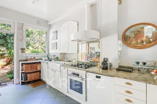 Propriété d'exception: ensemble immobilier de 2 maisons sur terrain arboré de 1400 m2