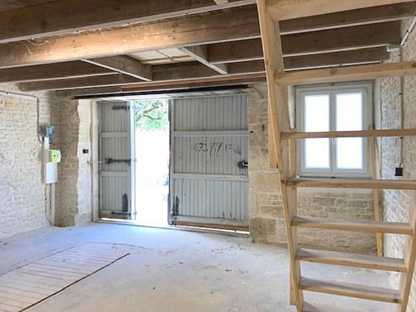 Garage sur 2 niveaux 70 m2 vendu loué