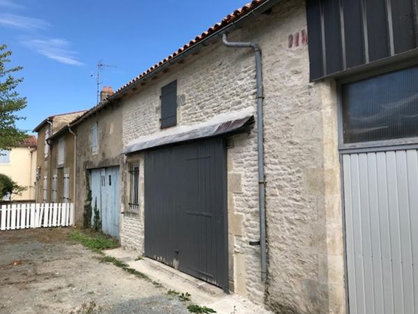 Garage sur 2 niveaux 70 m2 vendu loué