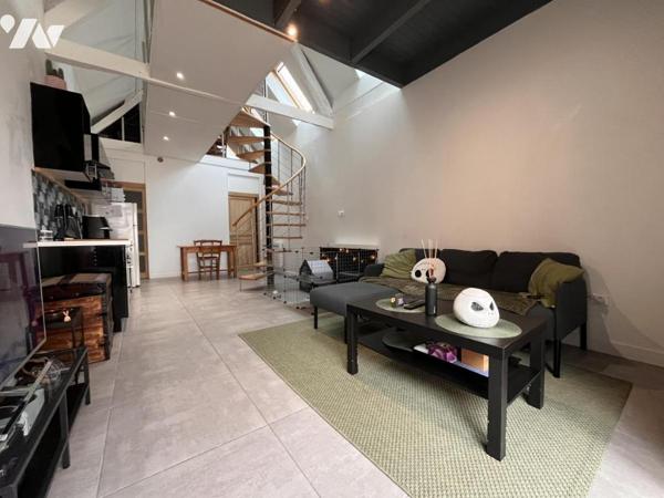 IMMEUBLE COMPRENANT 4 APPARTEMENTS LOUES 