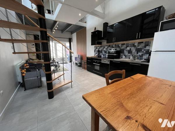 IMMEUBLE COMPRENANT 4 APPARTEMENTS LOUES 