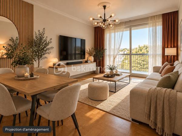 L'appartement comprend une véritable entrée desservant une cuisine aménagée, ainsi qu'un salon-séjour lumineux, équipé d'une grande baie vitrée et donnant accès à un balcon depuis lequel on peut apercevoir la Tour Eiffel.

L'espace nuit se compose de deux chambres de dimensions confortables, d'une salle de bains et d'un WC indépendant. De nombreux rangements viennent compléter l'agencement de cet appartement.

Le bien bénéficie d'un chauffage collectif au gaz par le sol, dont le coût est inclus dans les charges de copropriété.

Une cave ainsi qu'une place de stationnement extérieure sécurisée complètent ce bien.

D'importants travaux de rafraîchissement sont à prévoir, offrant aux futurs acquéreurs l'opportunité de moderniser l'appartement et de l'aménager selon leurs goûts.

Un appartement offrant un beau potentiel, au sein d'une résidence bien entretenue avec une belle luminosité.