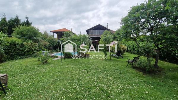 Maison de 213 m², dépendances, garage et piscine sur une parcelle de 847 m²