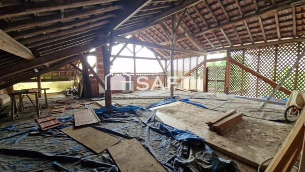 Maison de 213 m², dépendances, garage et piscine sur une parcelle de 847 m²