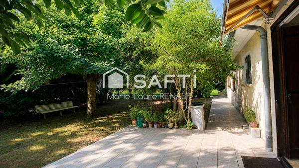 Maison familiale avec parc arboré et grand sous-sol