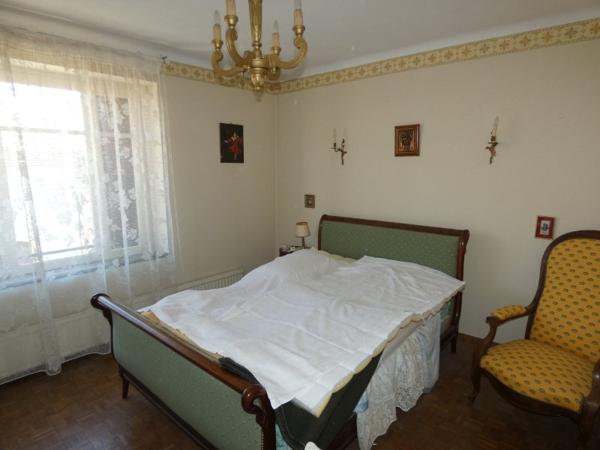 Maison T5 d'environ 104m² avec jolie cour intérieure, 2 terrasses et un garage-dépendance de 90m²