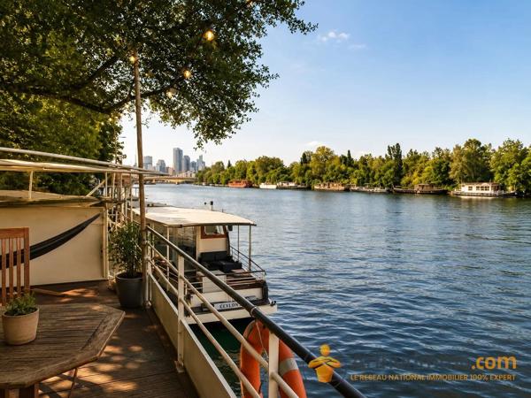 Vente                                                      Péniche
                        
                                         180 m2                     à Suresnes