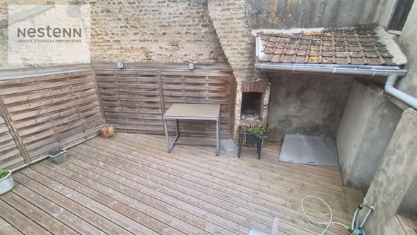 Immeuble centre de Calais composé d'un local commercial "loué "et d'un appartement T 6 de 220 m2 avec terrasse