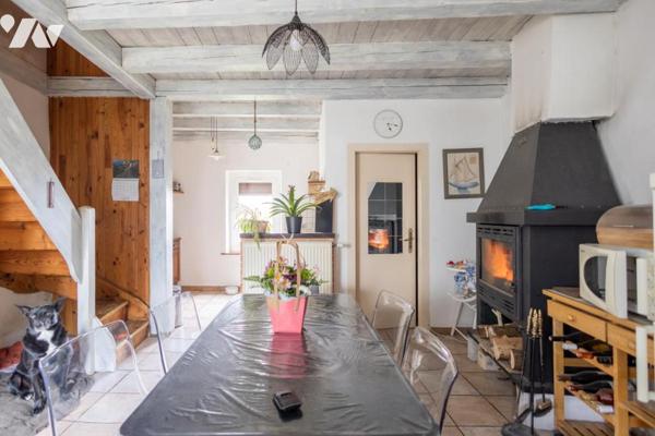 Bâtisse à Challex avec appartement de type 2 indépendant édifiée sur un terrain de 1167 m²