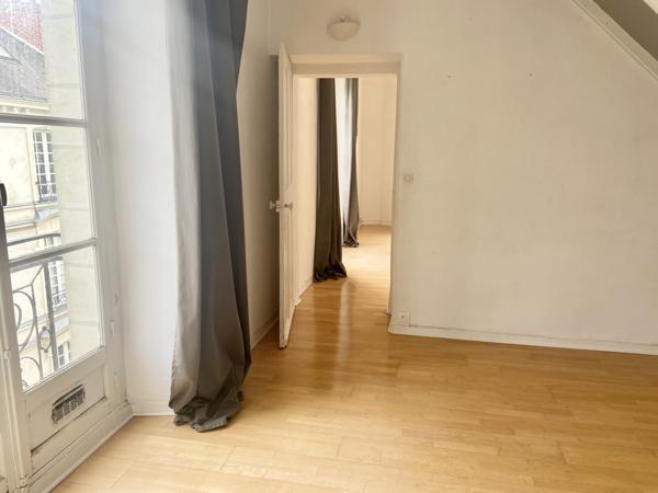 Decré- Appartement en duplex dernier étage