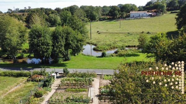 Pavillon sur sous-sol proche rivière