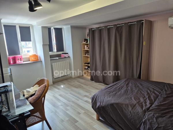 Maison centre ville en semi plain pied avec jardin et garage