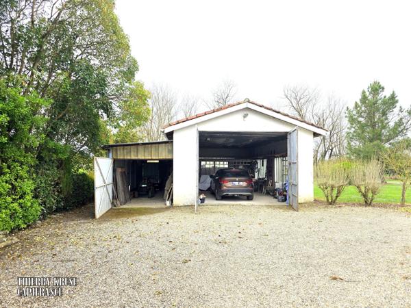 Maison quatre pièce, plain-pied, garages, sur magnifique parcelle de plus 2600m².