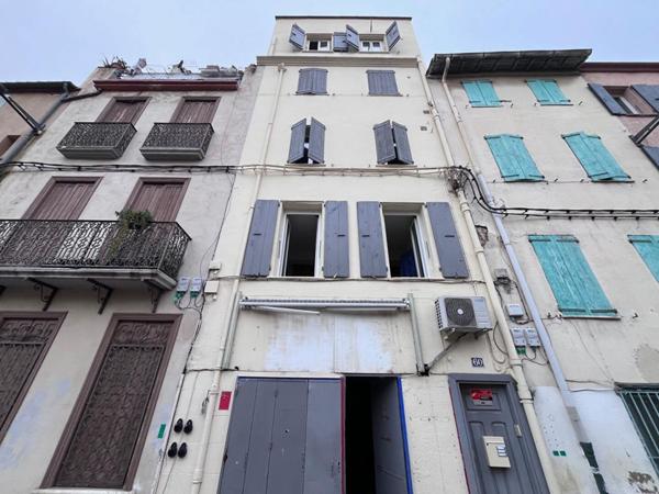 Immeuble de rapport comprenant 4 appartements et 1 local commercial en très bon état loué en étudiant et en AIR BNB