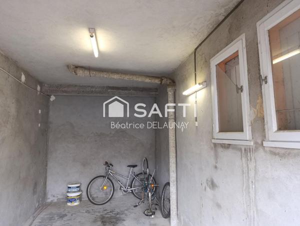 APPARTEMENT REZ-DE-JARDIN, GARAGE