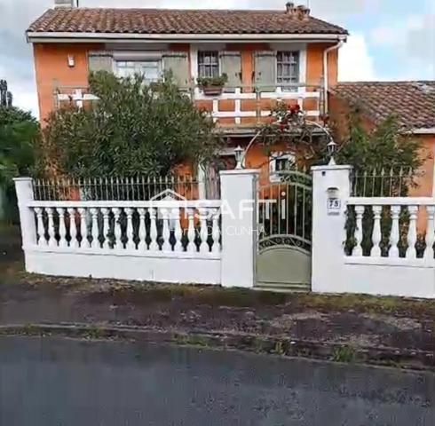 Maison familiale avec terrasse, véranda et garage