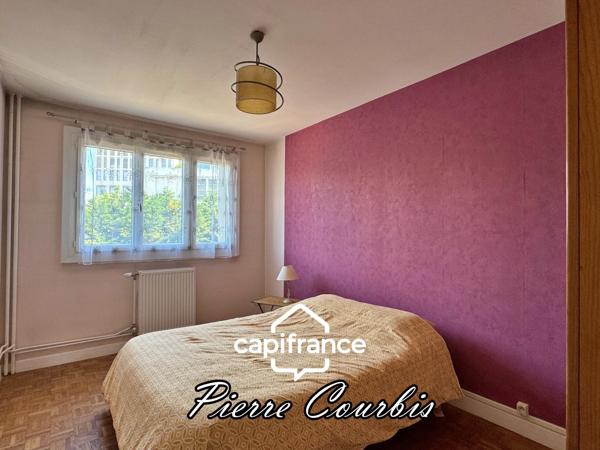 LYON 8 : T3 de 68 m² avec balcon, place de parking et cave