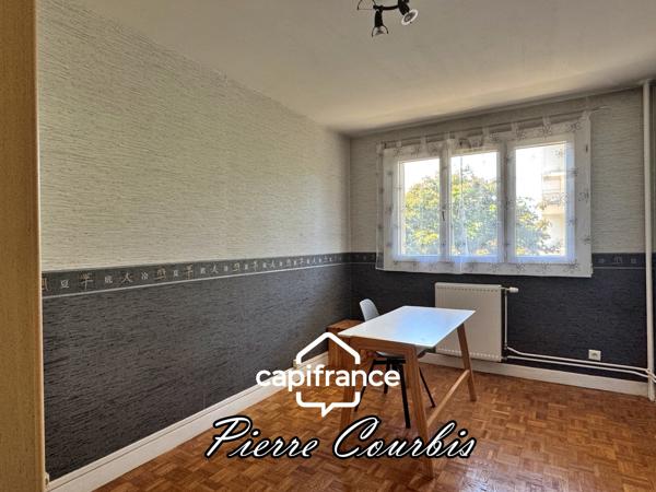 LYON 8 : T3 de 68 m² avec balcon, place de parking et cave