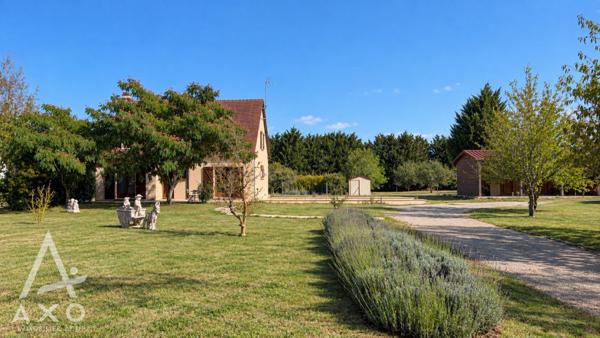 Maison familiale 5 chambres, sous-sol total et 8500m² de terrain
