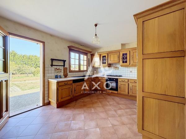 Maison familiale 5 chambres, sous-sol total et 8500m² de terrain