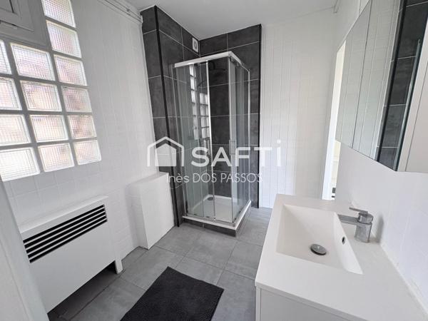 IMMEUBLE AVEC LOCAUX COMMERCIAUX