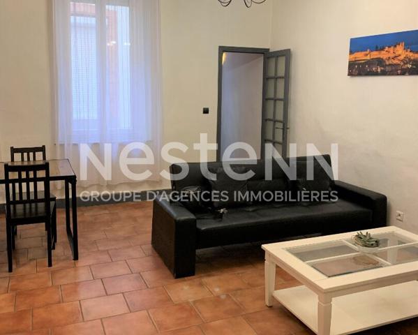 Carcassonne Bastide appartement T3 avec terrasse commune et cave vélo dans immeuble avec ascenseur