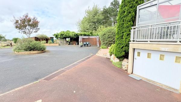 Maison 4 chambres avec véranda et jardin de 2 000 m²