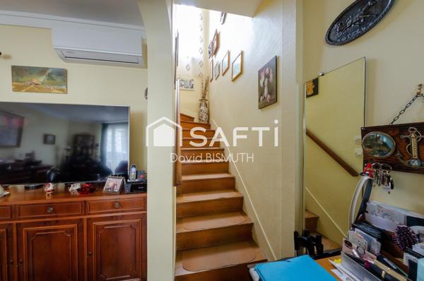 Maison 4 pièces 3 chambres de 76 m2 avec une dépendance un patio de 15 m2 et un sous sol de 60 m2 NOTE DPE D