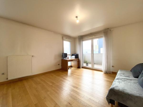 Appartement 3 pièces avec un balcon et une place de parking