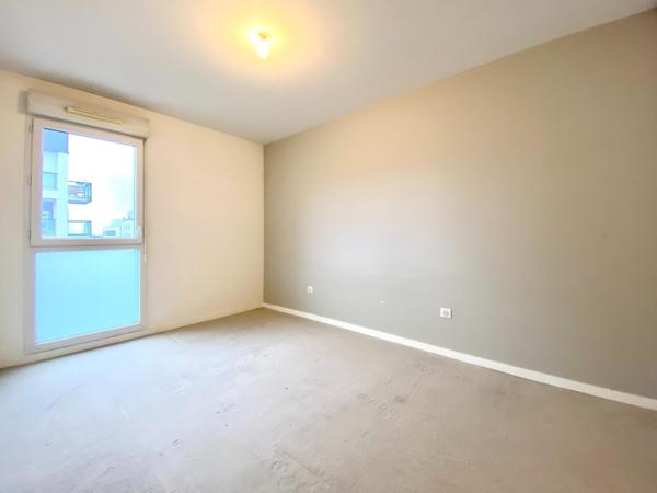 Appartement 3 pièces avec un balcon et une place de parking