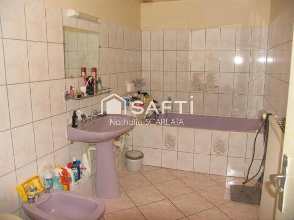 GROS POTENTIEL pour cette maison de 180 m² avec partie HABITATION et LOCAL COMMERCIAL