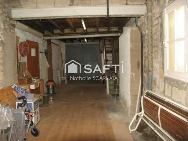 GROS POTENTIEL pour cette maison de 180 m² avec partie HABITATION et LOCAL COMMERCIAL