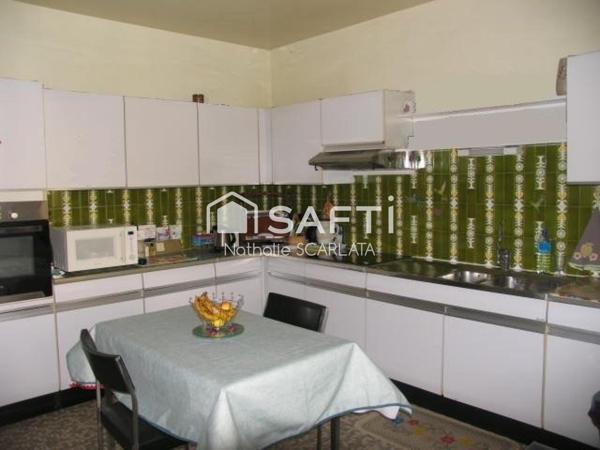 GROS POTENTIEL pour cette maison de 180 m² avec partie HABITATION et LOCAL COMMERCIAL