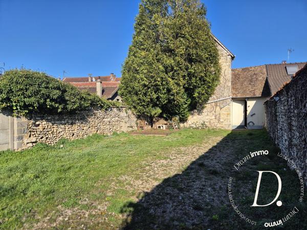 Commerce, habitation, grange et terrain constructible potentiel en centre-ville