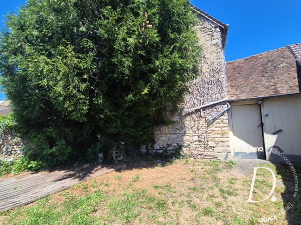 Commerce, habitation, grange et terrain constructible potentiel en centre-ville