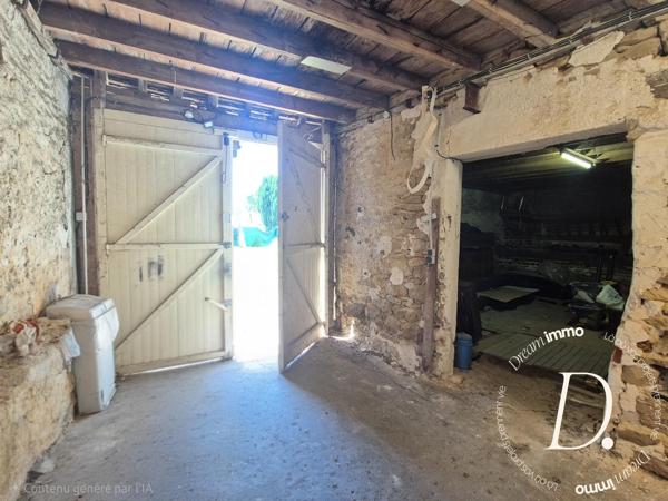 Commerce, habitation, grange et terrain constructible potentiel en centre-ville