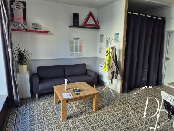 Commerce, habitation, grange et terrain constructible potentiel en centre-ville