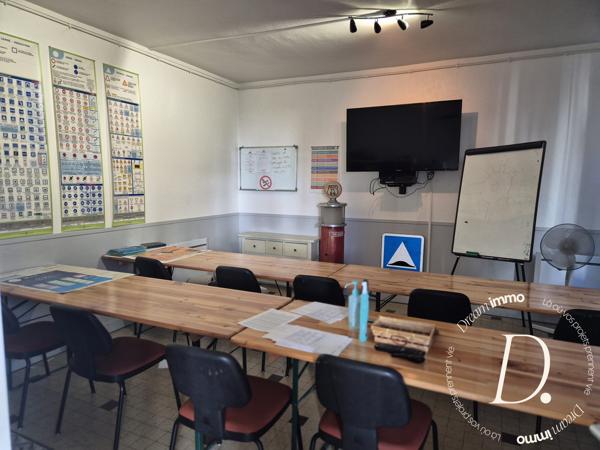 Commerce, habitation, grange et terrain constructible potentiel en centre-ville