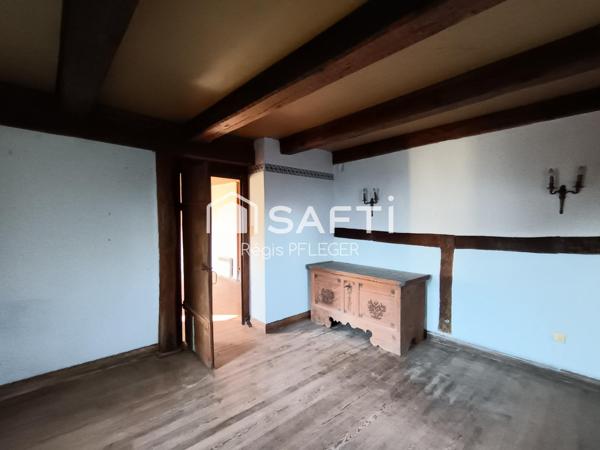 Maison de caractère avec beau potentiel
