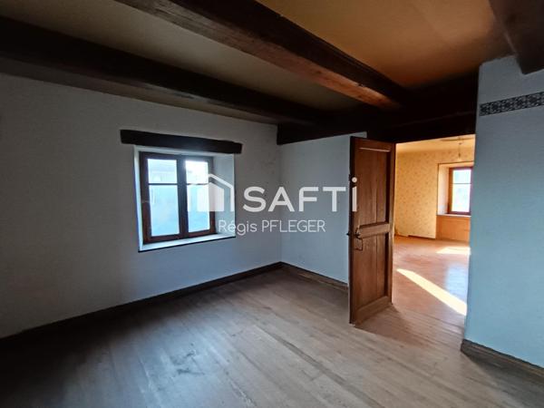 Maison de caractère avec beau potentiel