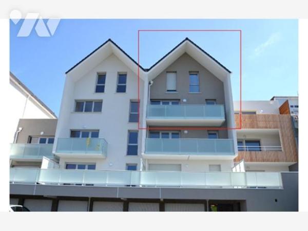 Appartement duplex vue mer avec balcon et stationnement, dans une résidence sécurisée avec ascenseur